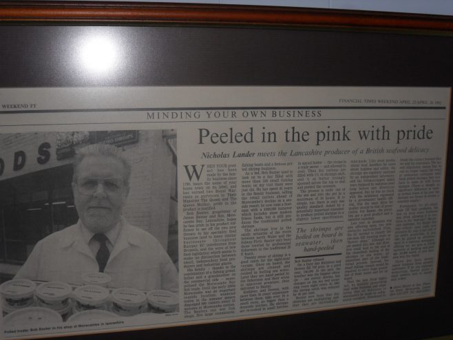 Photo of newspaper article entitled Peeled in the pink with pride