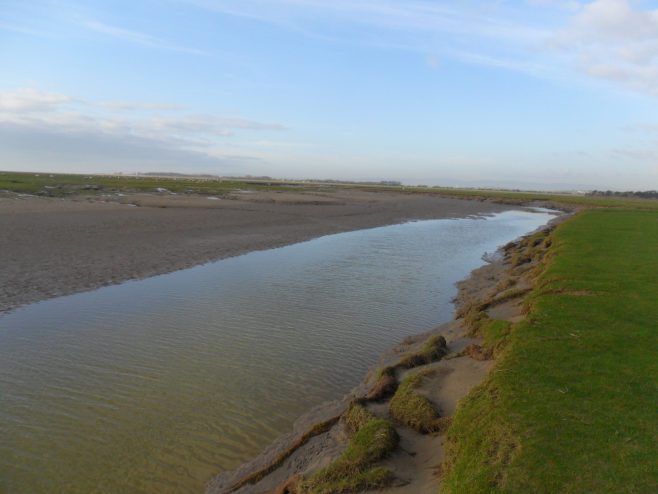 View of large channel on beach at Humphrey Head