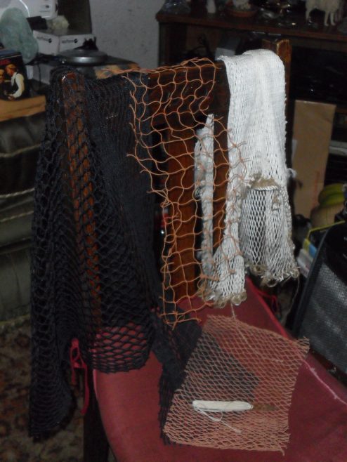 Close up of different types of fishing nets seen at the house of Ernie Nicholson, one of the oral history interviewees.