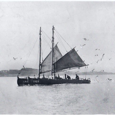 The shrimp boats "Volunteer" LR 175 and "Wahine" LR 57, sailing home past Heysham Head